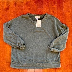 Everleigh sweater in an olive green. Gathered sleeves and cuffs in size large.